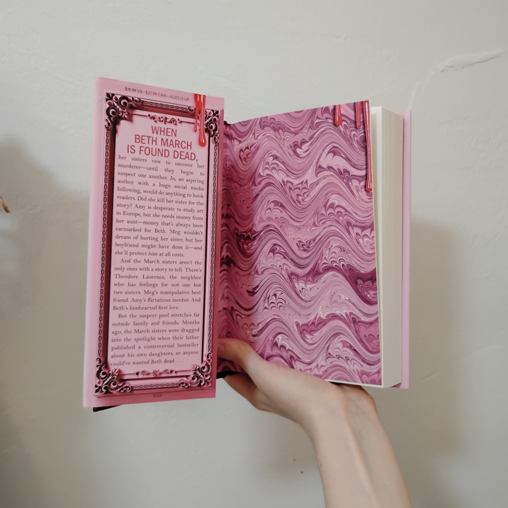 The endpages inside are various shades of pink in a wavy swirly pattern.