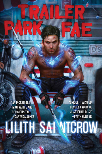 Trailer Park Fae by Lilith Saintcrow - The illustrated cover shows a moderately attractive and shirtless man sitting in a lawn chair in front of a trailer with trash scattered about. His tattoos are glowing with wispy blue magic, as is the staff-like weapon he's holding.